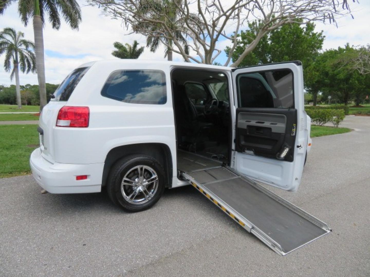 2012 White /Black with an 4.6L V8 engine, Automatic transmission, located at 4301 Oak Circle #19, Boca Raton, FL, 33431, (954) 561-2499, 26.388861, -80.084038 - You are looking at a Gorgeous 2012 Mobility Ventures MV1 Handicap Wheelchair Conversion Van with 64K Original Miles, 4.6L Ford V8, Bleack Leather Type Interior, Alloy Wheels, Power Side Entry Wheelchair Lift with Long Ramp and Short Ramp Function, Q Lock 150 EZ Lock, L-Track Tie Down System, Back Up - Photo#36